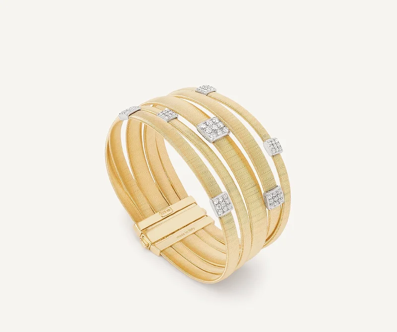 18K Yellow Gold 4-Strand Coil Bracelet With Diamonds Stations